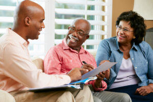 An older couple meeting with their estate planning lawyer.