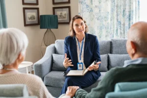 An attorney speaking with an elderly couple.