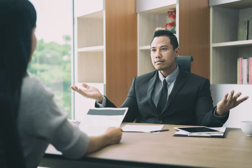 Lawyer advising aspiring entrepreneur on business formation.